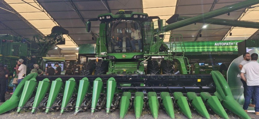 Large combine harvester on display at the John Deere stand at Agrishow.

